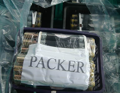 Consolidation coal hole packers are wrapped into plastic films, in plastic baskets.